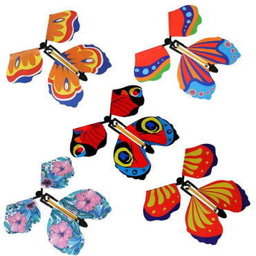 Magic Flying Butterfly toy with wind-up mechanism, fluttering out of books and cards for a whimsical surprise, perfect for gifts, parties, and celebrations.