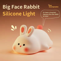 Cute rabbit-shaped silicone night light, soft and touch-sensitive lamp for a cozy bedroom ambiance.