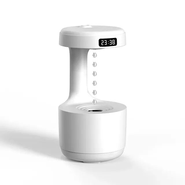 Ultrasonic Water Droplet Air Humidifier with anti-gravity mist technology, LED night light, and sleek design for improving air quality and creating a calming atmosphere.