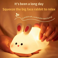 Cute rabbit-shaped silicone night light, soft and touch-sensitive lamp for a cozy bedroom ambiance.