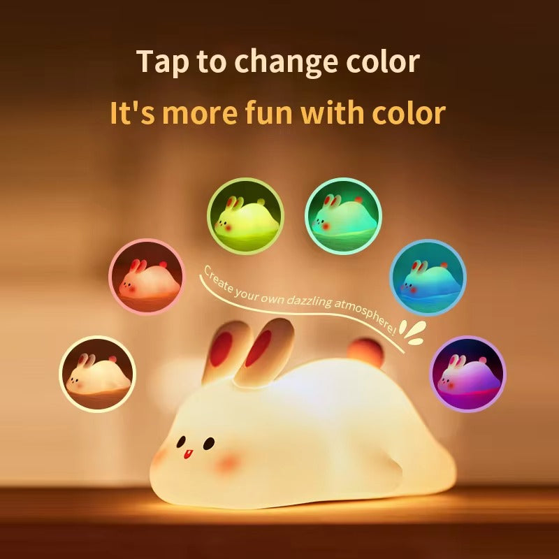 Cute rabbit-shaped silicone night light, soft and touch-sensitive lamp for a cozy bedroom ambiance.