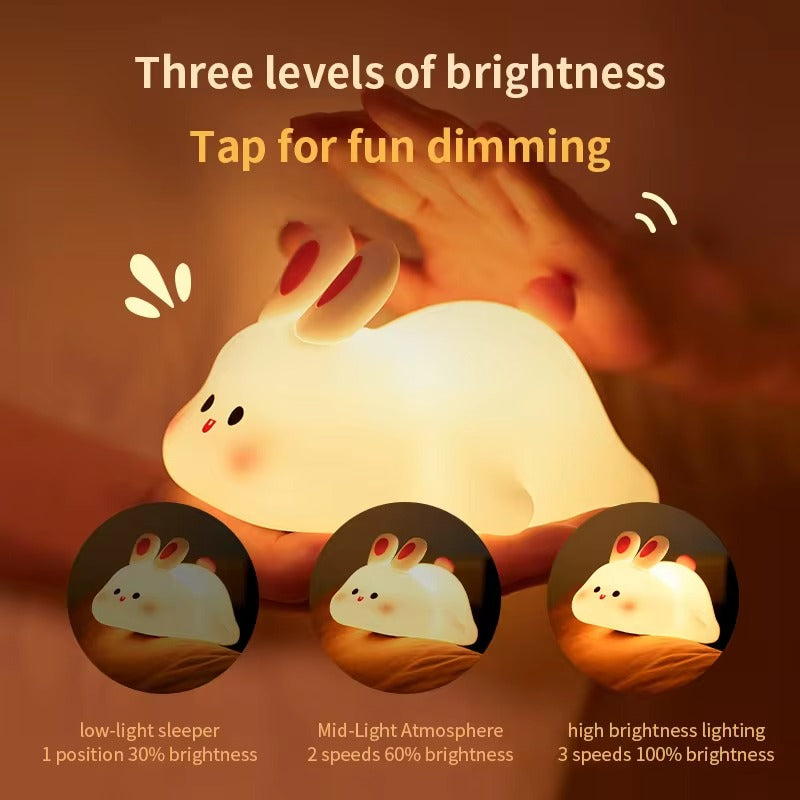 Cute rabbit-shaped silicone night light, soft and touch-sensitive lamp for a cozy bedroom ambiance.