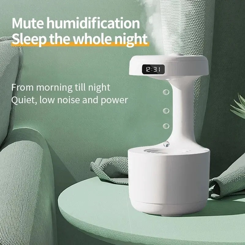 Ultrasonic Water Droplet Air Humidifier with anti-gravity mist technology, LED night light, and sleek design for improving air quality and creating a calming atmosphere.