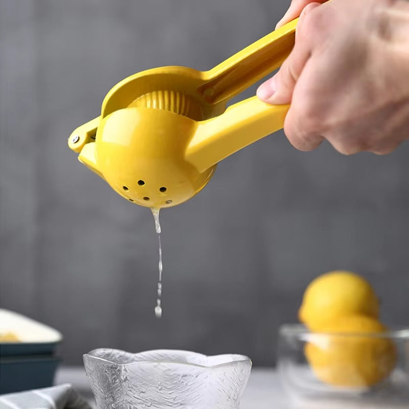 Manual Lemon Squeezer made from durable aluminum alloy for easy juice extraction from citrus fruits, compact, portable, and efficient for everyday use.