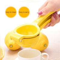 Manual Lemon Squeezer made from durable aluminum alloy for easy juice extraction from citrus fruits, compact, portable, and efficient for everyday use.