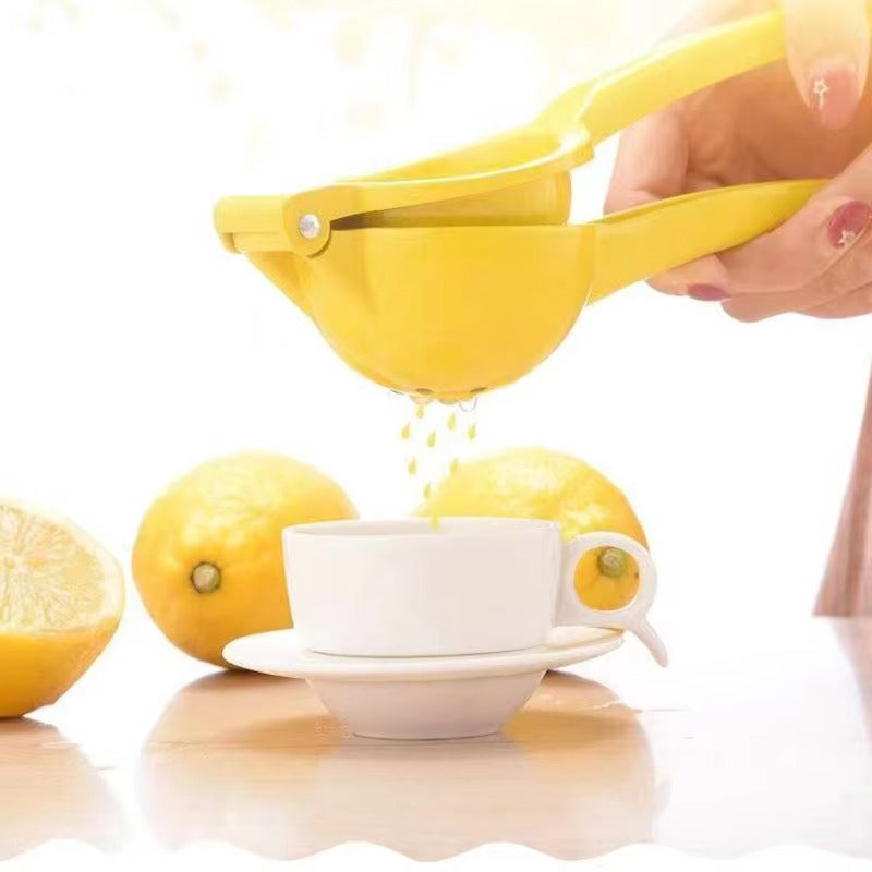 Manual Lemon Squeezer made from durable aluminum alloy for easy juice extraction from citrus fruits, compact, portable, and efficient for everyday use.