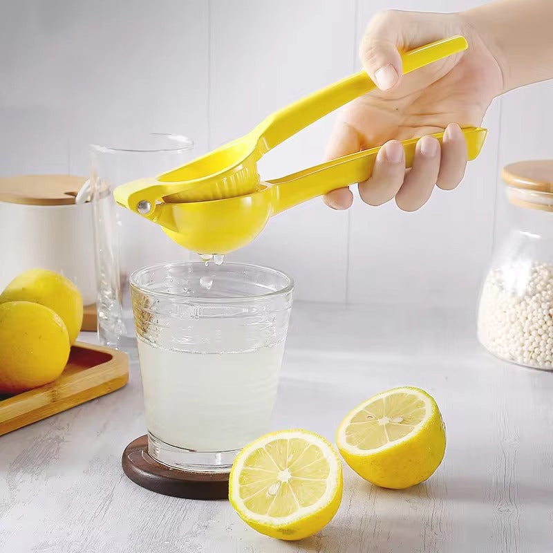 Manual Lemon Squeezer made from durable aluminum alloy for easy juice extraction from citrus fruits, compact, portable, and efficient for everyday use.