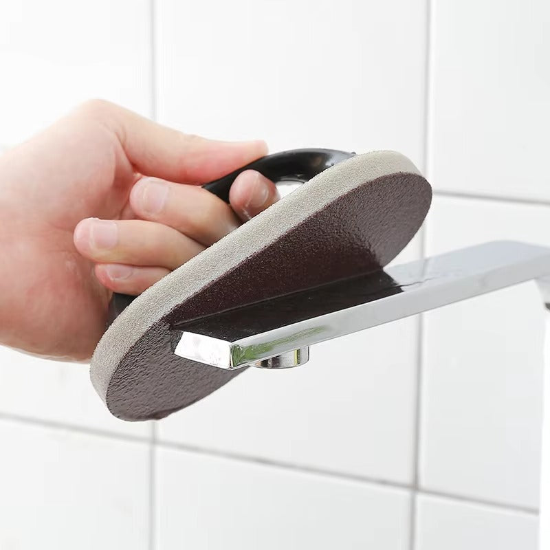 Magic Sponge with ergonomic handle for tough stain, grease, and grime removal, ideal for cleaning countertops, sinks, and tiles with ease and comfort.