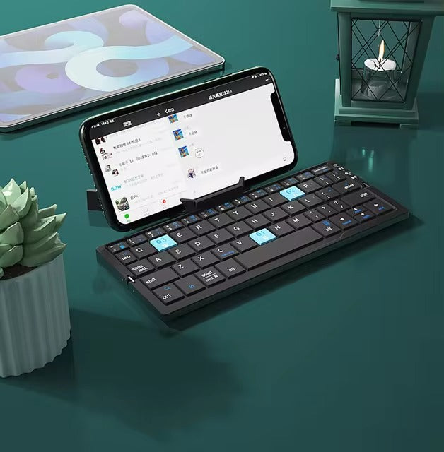 Foldable Bluetooth keyboard, portable and wireless keyboard for convenient typing on the go, compatible with various devices.