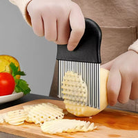 Stainless Steel Wave Knife with sharp, crinkle-cut blade for precise vegetable slicing and potato fries preparation.