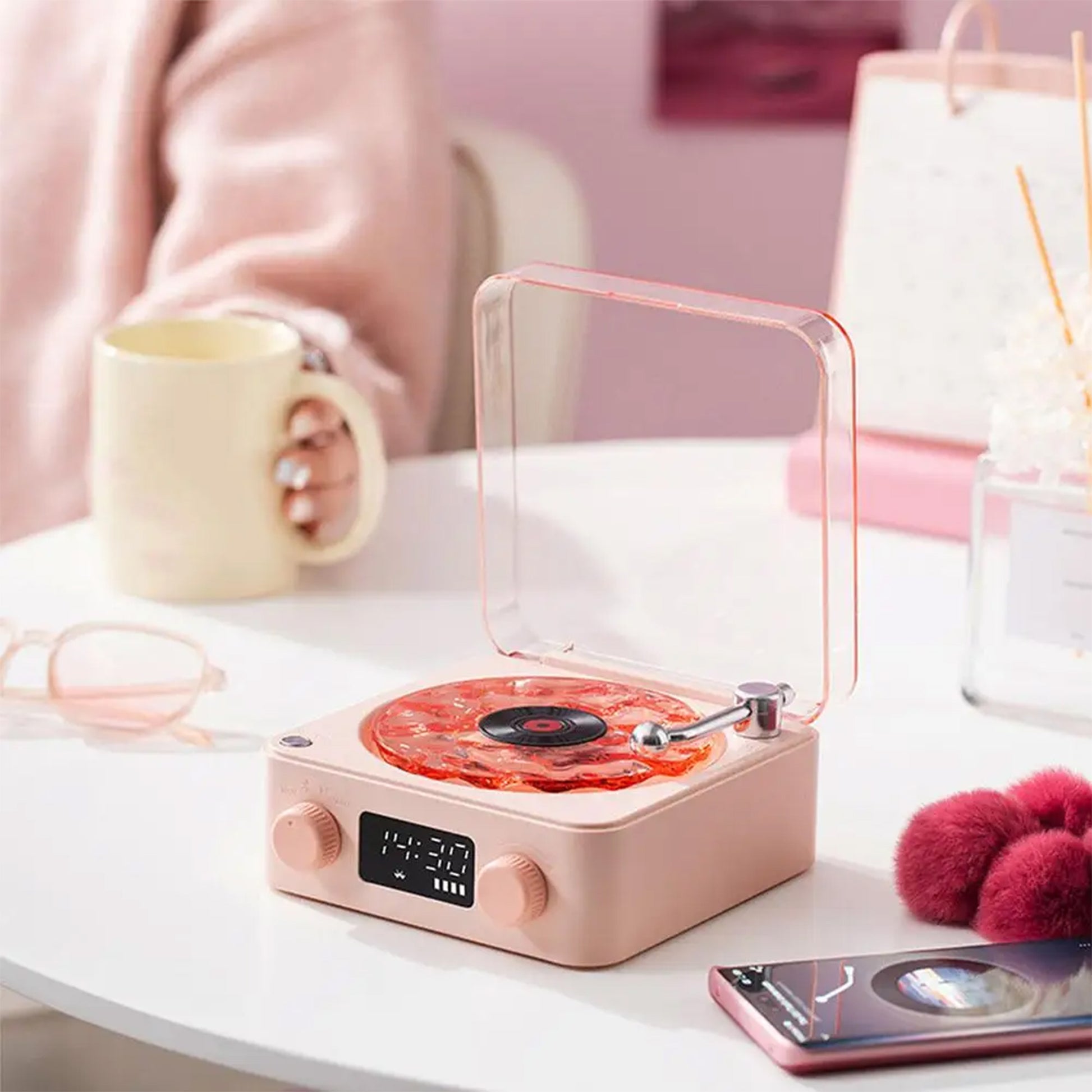 Portable Vinyl Wave Player: A retro-inspired wireless speaker offering classic vinyl sound, soothing wave sounds for sleep, and adjustable RGB lights. Compact and perfect for any space.